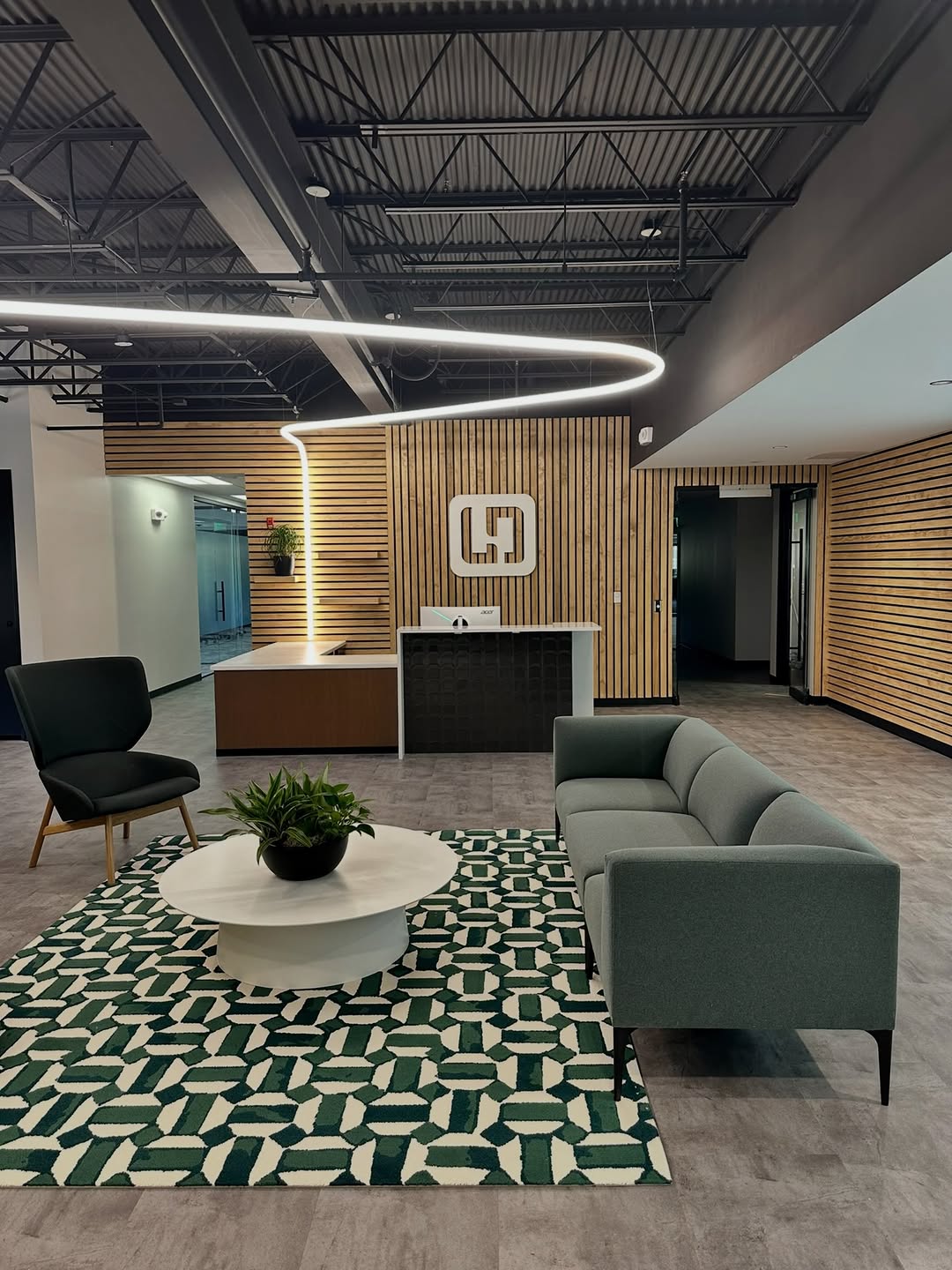 Custom branded lobby installation produced by Pro Color